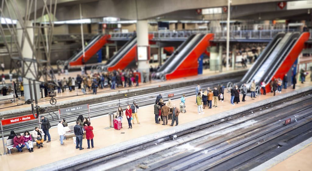 Travel management companies are investing heavily in new technology tools for travelers. A train station in Madrid is pictured here.