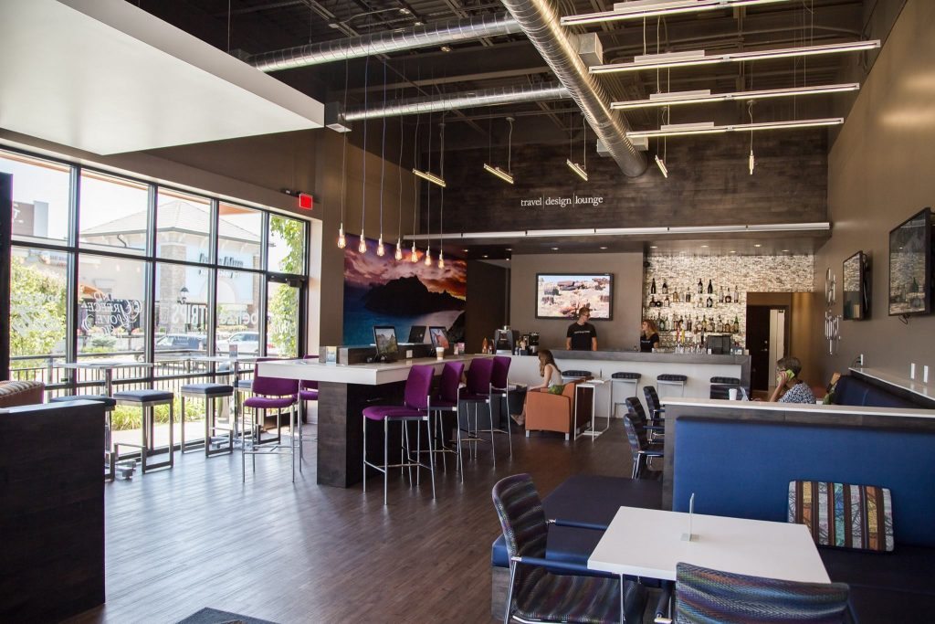 The Travel Design Lounge in Omaha, NE incorporates food and drink into its more traditional travel agent offerings. 