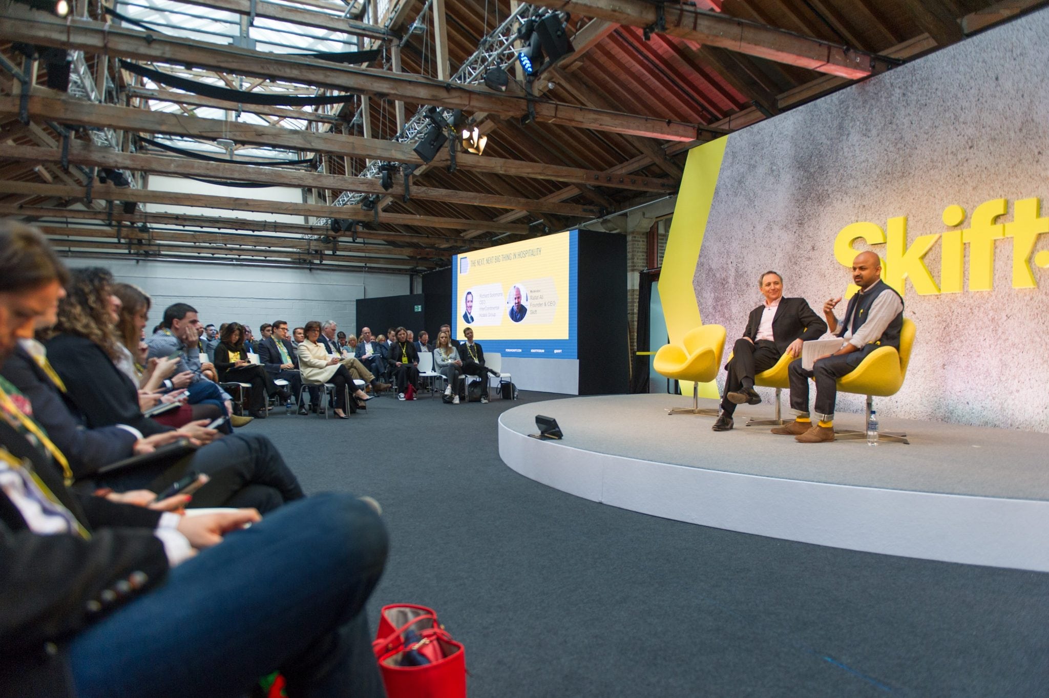 InterContinental Hotels Group CEO Richard Solomons speaking with Skift's Rafat Ali (R) at Skift Forum Europe in London on April 4, 2017. 