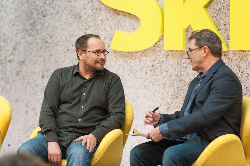 Skyscanner wants to become a branded storefront for airlines. Skyscanner co-founder and CEO Gareth Williams (left) speaking with Skift's Dennis Schaal at Skift Forum Europe in London on April 4, 2017. 