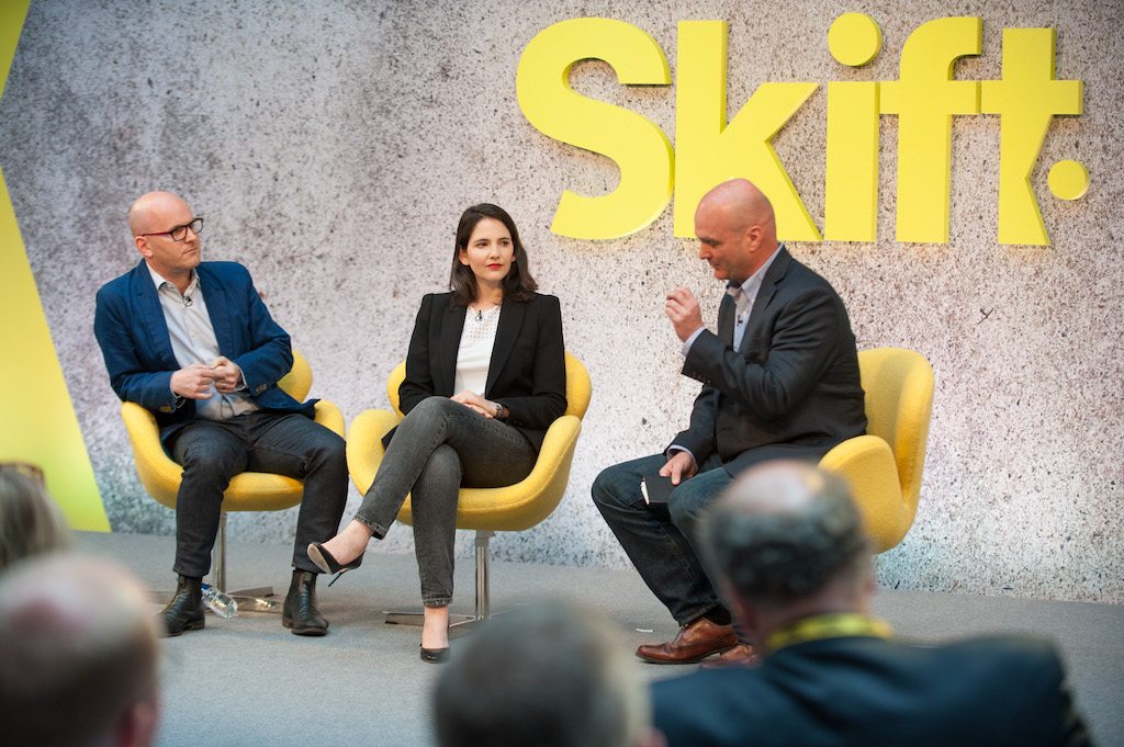 Noma Chief Operating Officer Ben Liebmann, left, with VizEat Chief Operating Officer Camille Rumani and Skift editor Greg Oates on stage at Skift Forum Europe.