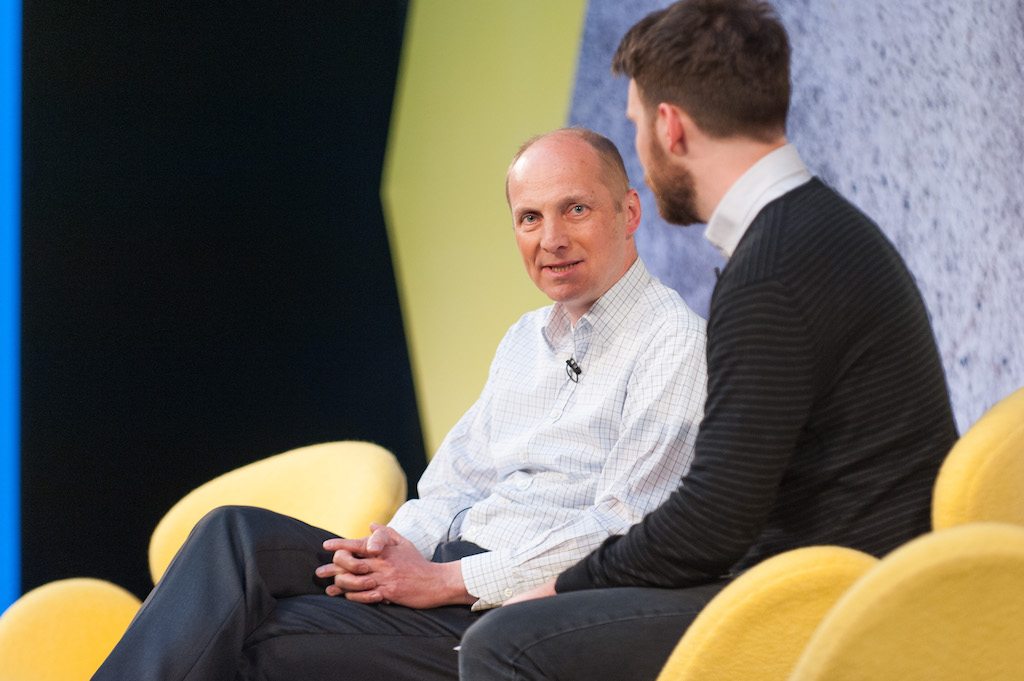TUI Group CMO Erik Friemuth speaking with Skift's Patrick Whyte (R) at Skift Forum Europe in London on April 4, 2017 