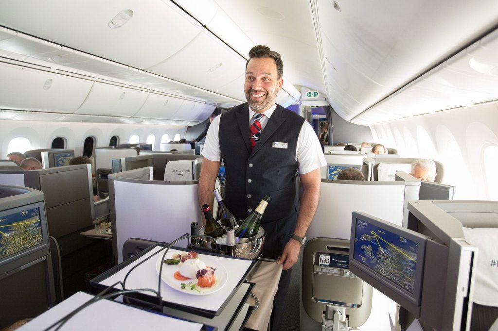 A flight attendant serves special meals on board a British Airways 787-9.