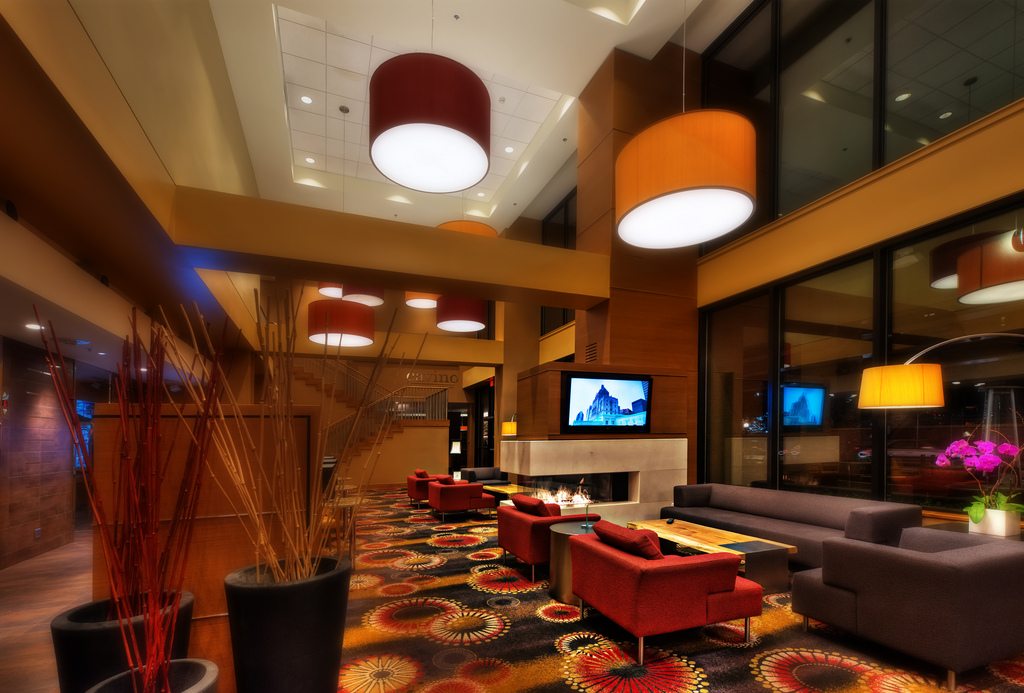 Traditional hotel rooms are not always the best choice for business travelers; extended stay properties are evolving to meet the needs of modern customers and homesharing companies are working to appeal to road warriors. The lobby of a Residence Inn in Vancouver, B.C. is shown in this photo. 