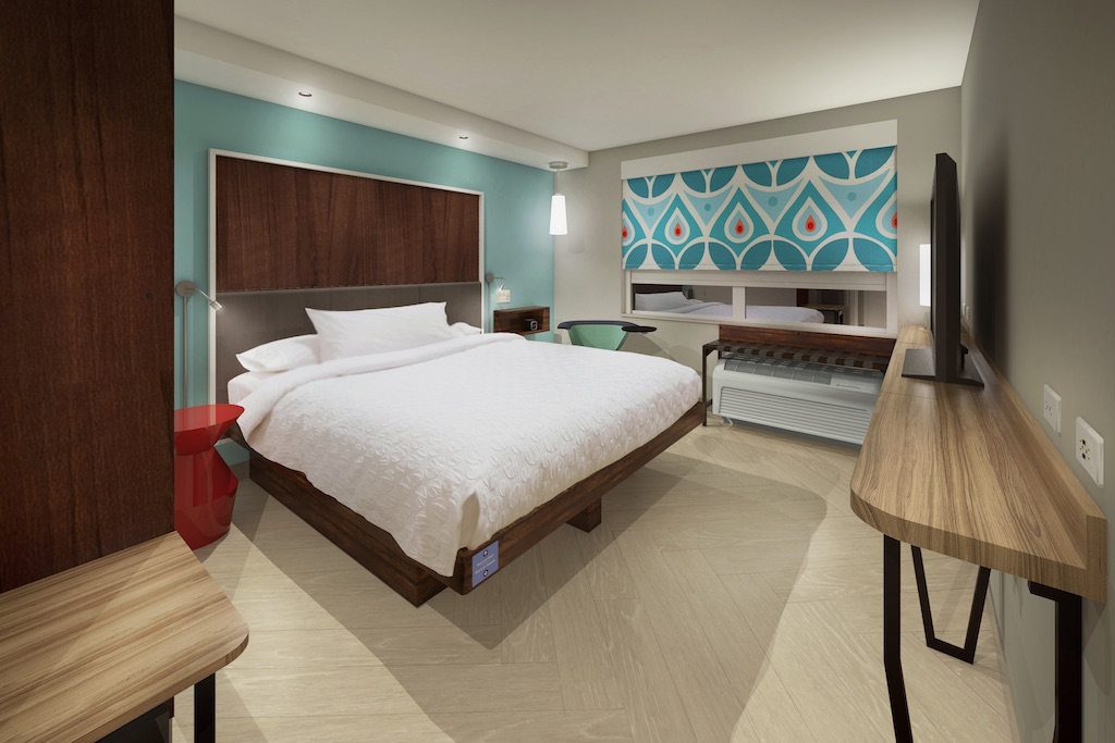 A rendering of a guest room of a Tru by Hilton hotel. Hilton expects to open its first Tru by Hilton property by this year. 