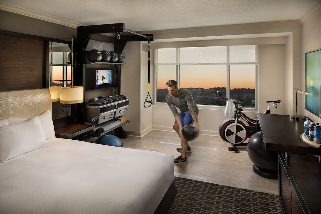 Hilton's new Five Feet to Fitness room design for full-service hotel brands brings the gym into the guest room.