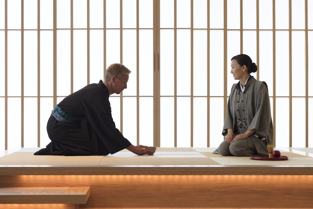 A guest at the Hoshinoya Tokyo takes part in a traditional Japanese tea ceremony. Hoshino Resorts CEO Yoshiharu Hoshino hopes to bring this hospitality concept to the rest of the world. 