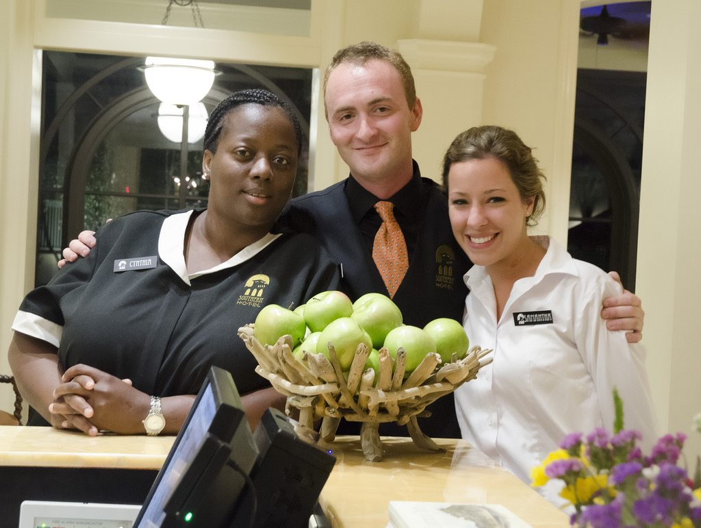Tourism directly supported 5.5 million jobs in the U.S. last year, according to a new report. Pictured are employees at the Southern Hotel in Covington, Lousiana.
