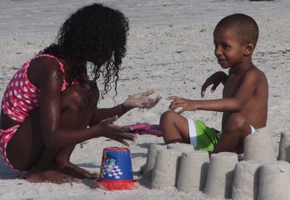 Visit Florida's final budget of $76 million was approved on Friday and heads to the governor for a signature. Pictured are children playing on a beach in Clearwater, Florida.