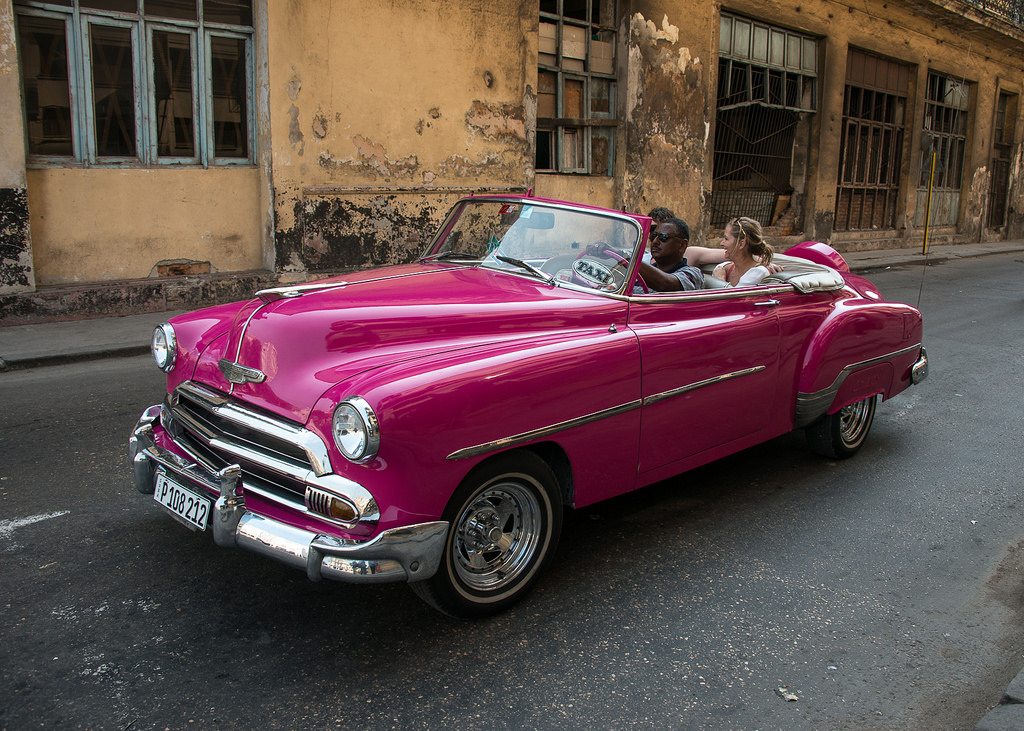 The U.S. stands to lose billions of dollars and thousands of jobs should President Trump roll back Cuba travel policies. Pictured are tourists in Havana, Cuba.