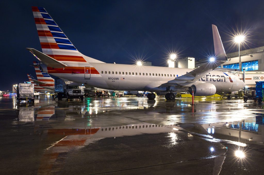 Travel distribution is changing, though still relies on decades-old systems. Some in the industry, including American Airlines, are trying new approaches. In this photo, an American Airlines plane is shown at Miami International Airport.