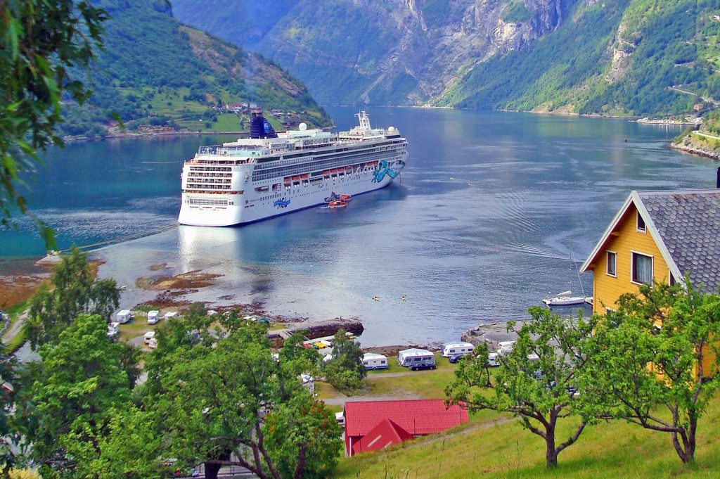 A Norwegian Cruise Line ships is pictured in Norway. Cruise companies are reporting that passengers are booking their cruises earlier, in part because they are getting more perks for locking in a cruise farther in advance.
