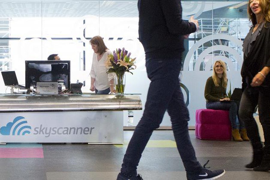 At Skyscanner's Edinburgh, Scotland headquarters, some of the company's 900 employees gather at various times. The company is experiencing steady growth under its new owner, Ctrip.