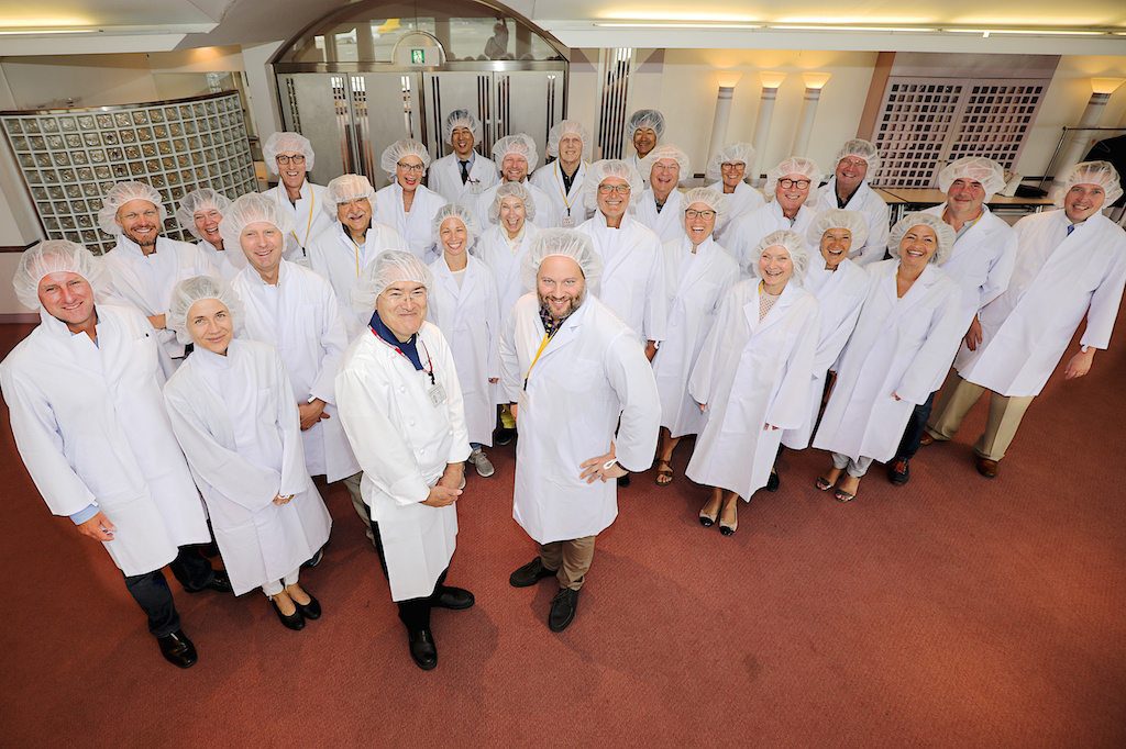 SAS frequent flyers visit the airline's catering kitchen near Tokyo Narita Airport during a recent trip led by the airline's head chef, Peter Lawrance. Lawrance is the foreground center, with a beard.