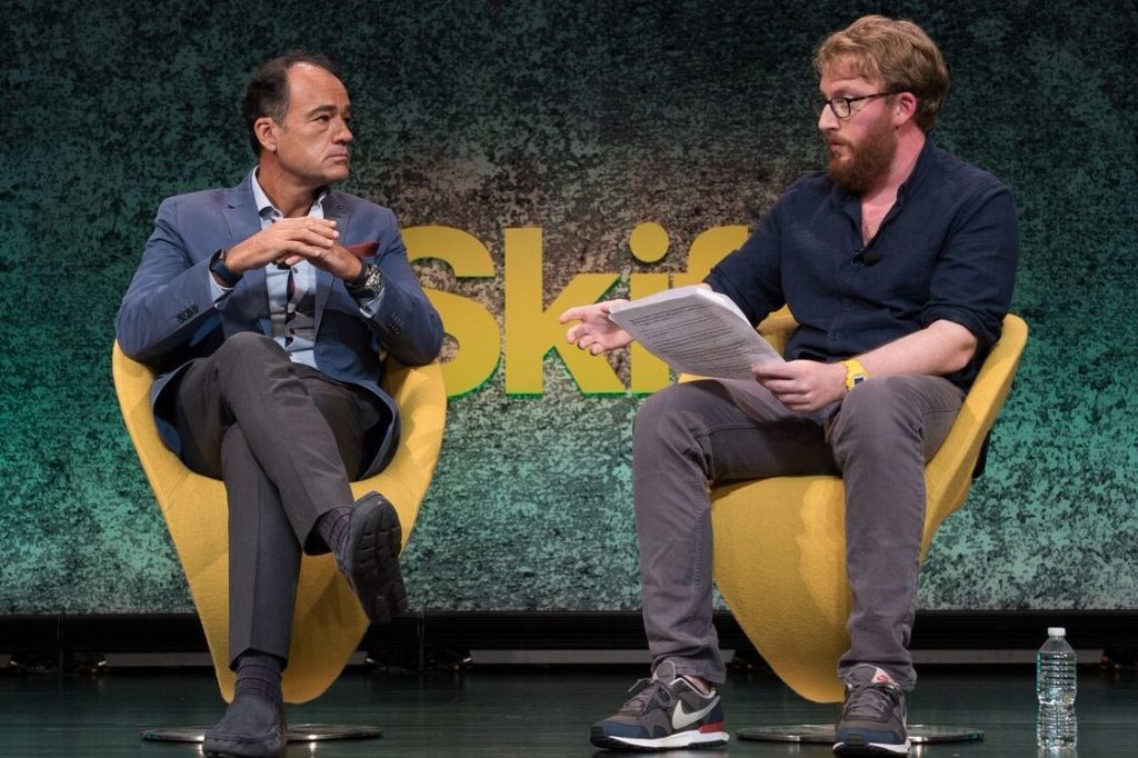 Apple Leisure Group will acquire Mark Travel Corp., including its popular brands like Funjet Vacations and United Vacations. Pictured is Apple Leisure Group CEO Alex Zozaya (left) speaking with Skift Business Travel Editor Andrew Sheivachman at Skift Global Forum in New York City in September 2017.
