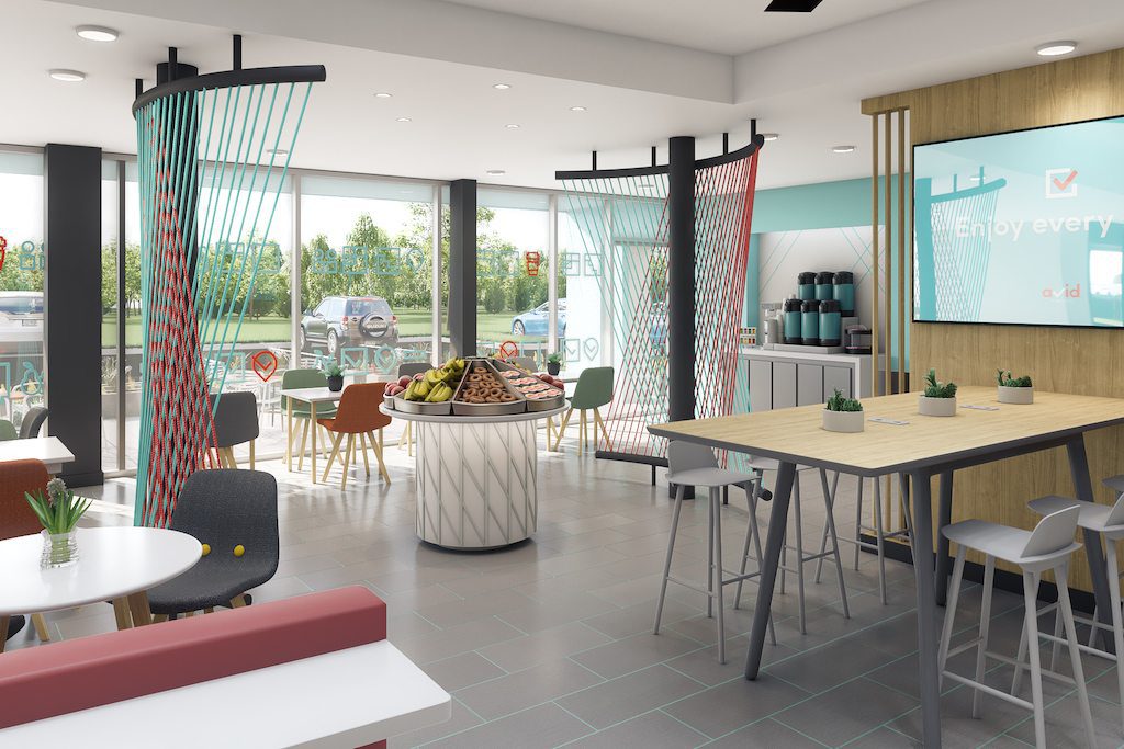 Pictured is an InterContinental Hotels Group lobby breakfast area. The chain plans to debut the concept behind its 17th hotel brand next week.