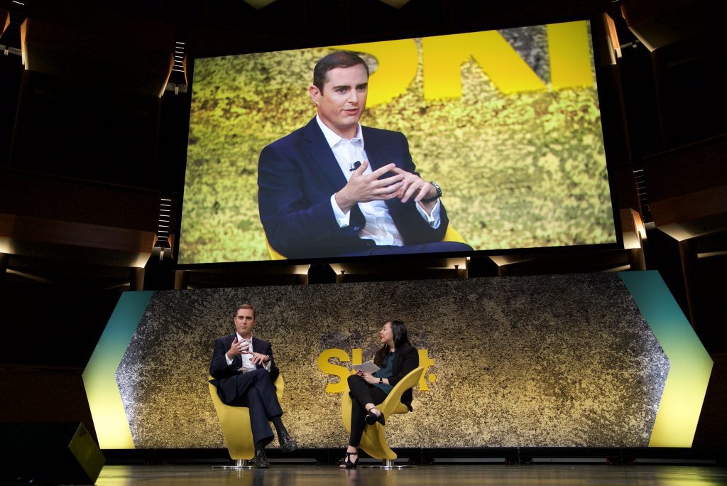 Pictured is Intercontinental Hotel Group CEO Keith Barr (L) speaking to moderator Deanna Ting on stage at Skift Global Forum in New York City on Sept. 26, 2017.