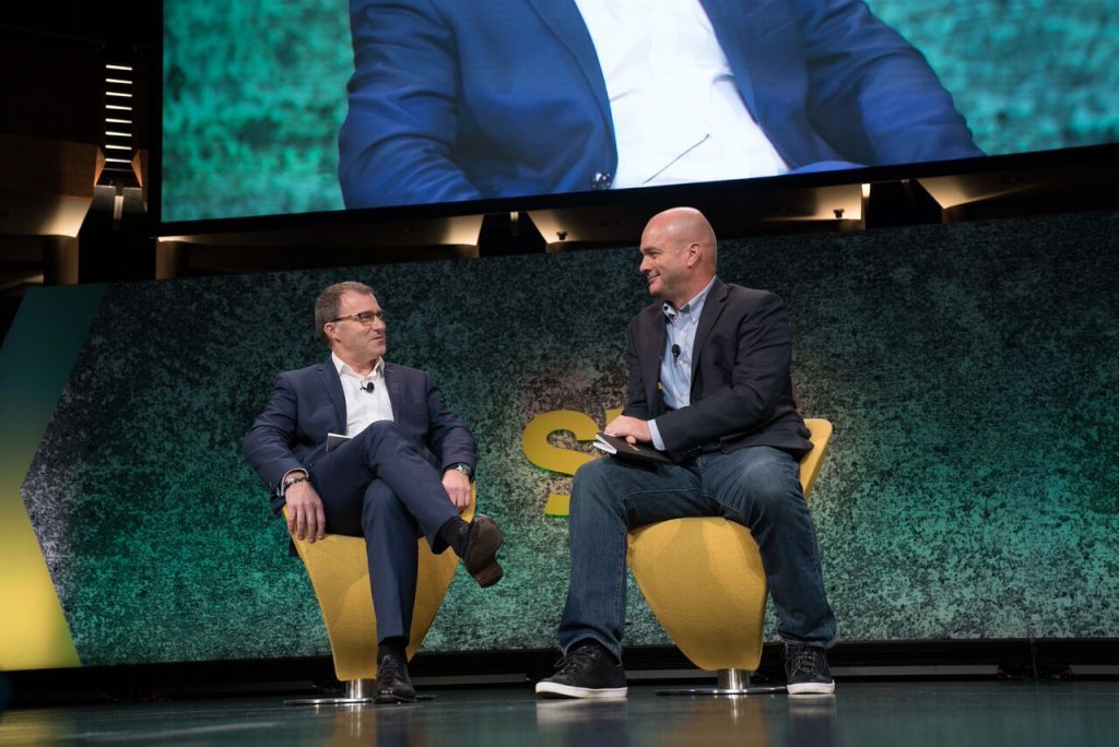 Aman Hotel COO Roland Fasel (left) speaking at Skift Global Forum in New York City on September 27, 2017. SkiftX editor Greg Oates is at right.