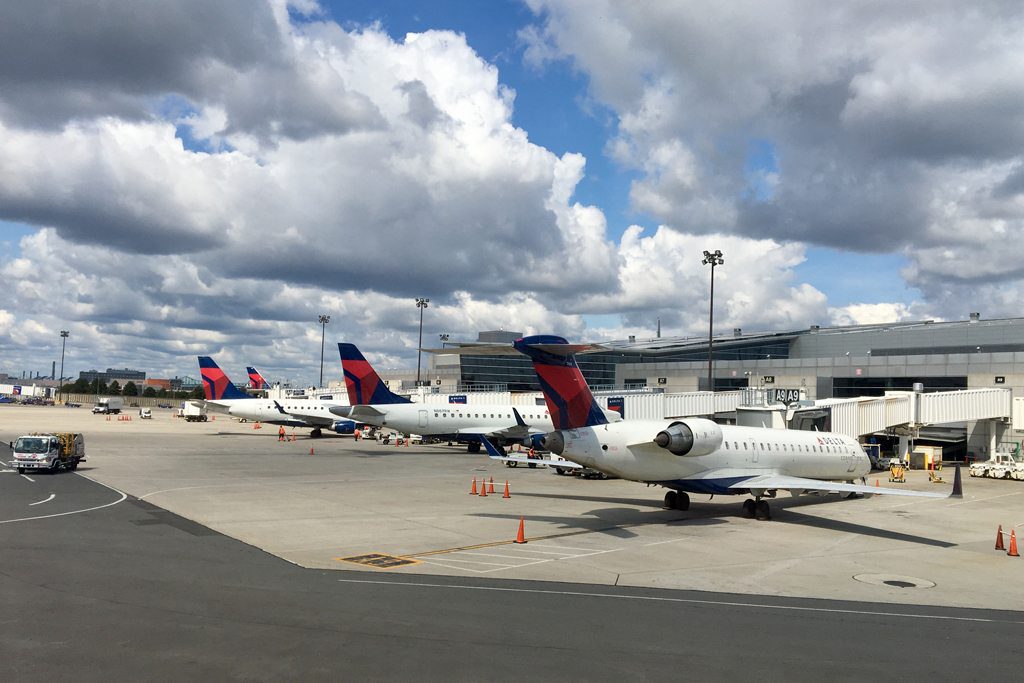 Delta Air Lines aircraft at Boston Logan International Airport. Delta CEO Ed Bastian dismissed threats posed by discount transatlantic airlines.
