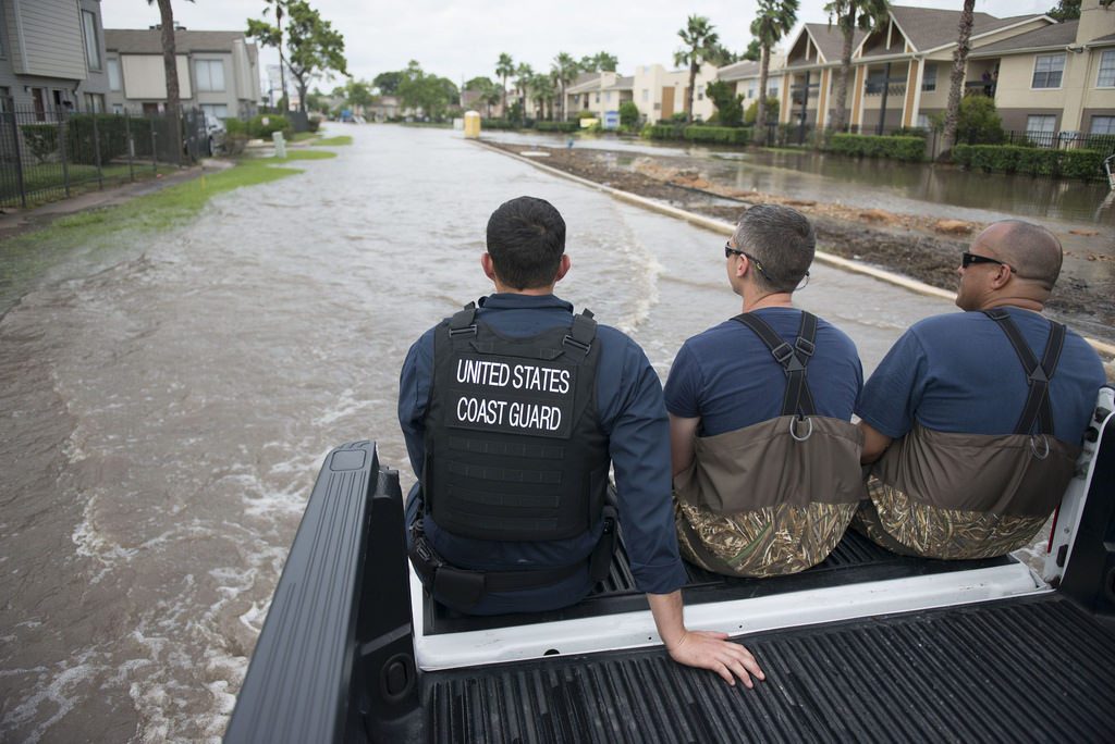 Hurricane-ravaged destinations are launching marketing campaigns to try to move past the storms. Pictured are members of the U.S. Coast Guard in Houston after Hurricane Harvey in August.