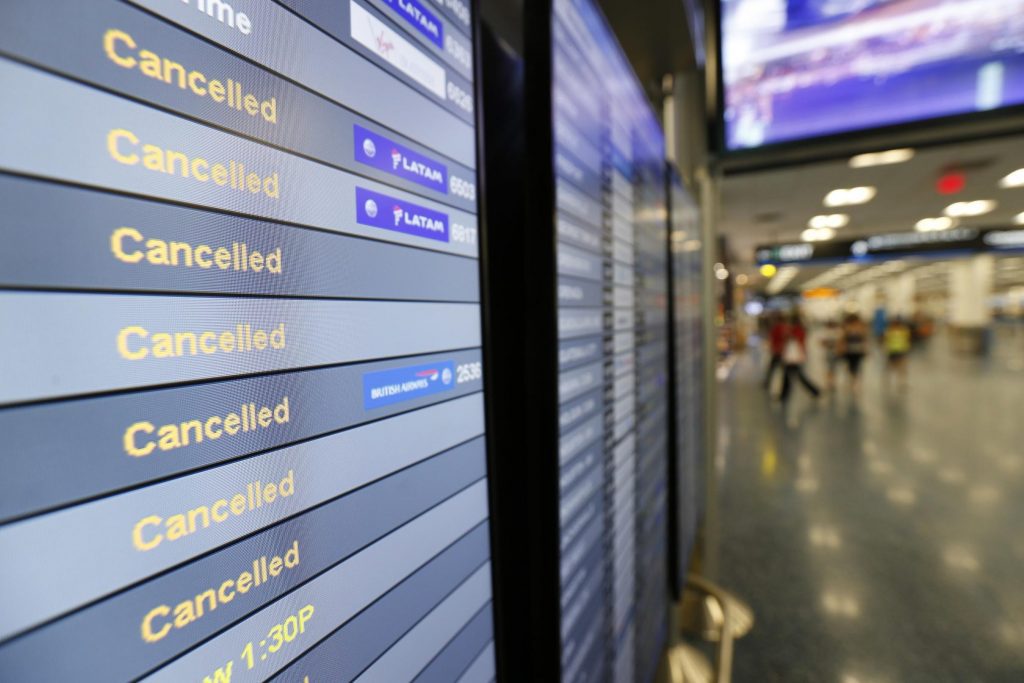 This photo shows a monitor listing canceled flights at Miami International Airport in Miami in early 2017, when airlines canceled many flights due to hurricanes.
