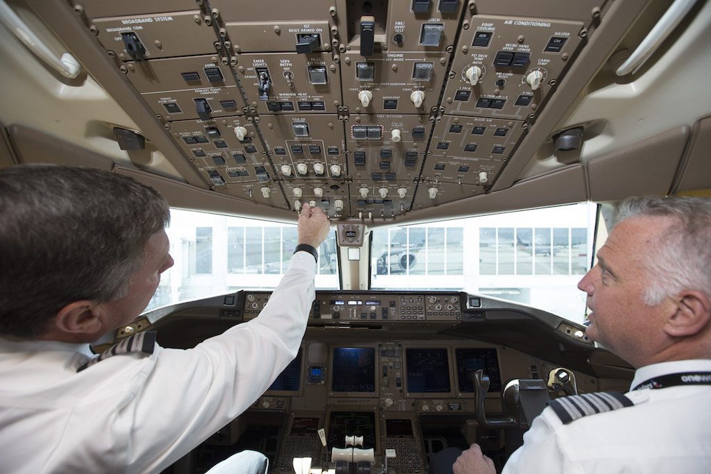 American Airlines pilots confer in a Boeing 777. The airline might be facing a pilot shortage in December.