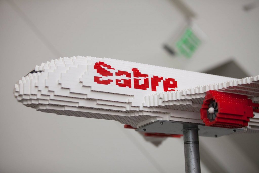 Sabre is leaving it to agency partners to negotiate directly with the airline. Pictured is an image depicting Sabre from a hackathon in Las Vegas in June 2017.