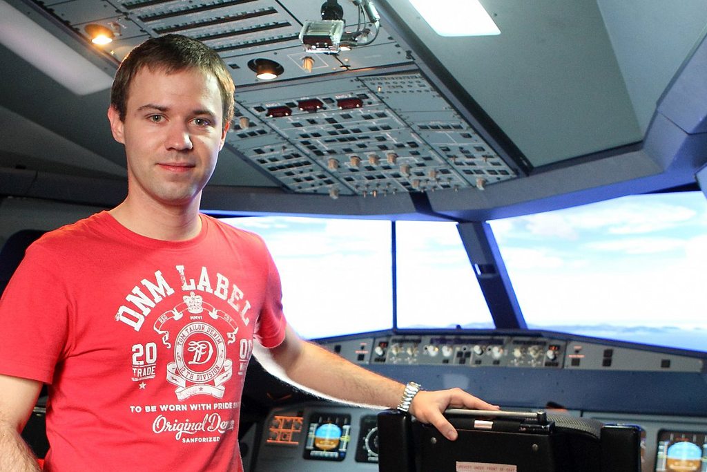 Pictured is Kiwi.com co-founder and CEO Oliver Dlouhy. He's shown here at an airplane simulator in Prague in the Czech Republic.