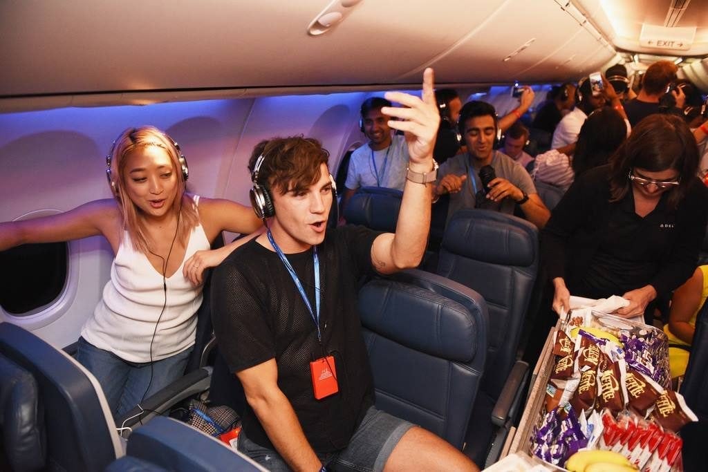 As part of its strategy to attract younger customers, Delta earlier this year hosted a silent disco party in New York. Passengers wore headphones to listen to music.