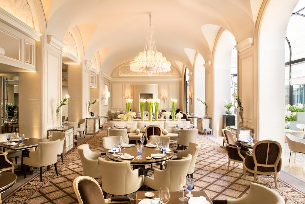At Le George restaurant (shown here) at the Four Seasons George V hotel in Paris, servers are encouraged to wear their own clothes instead of wearing uniforms.