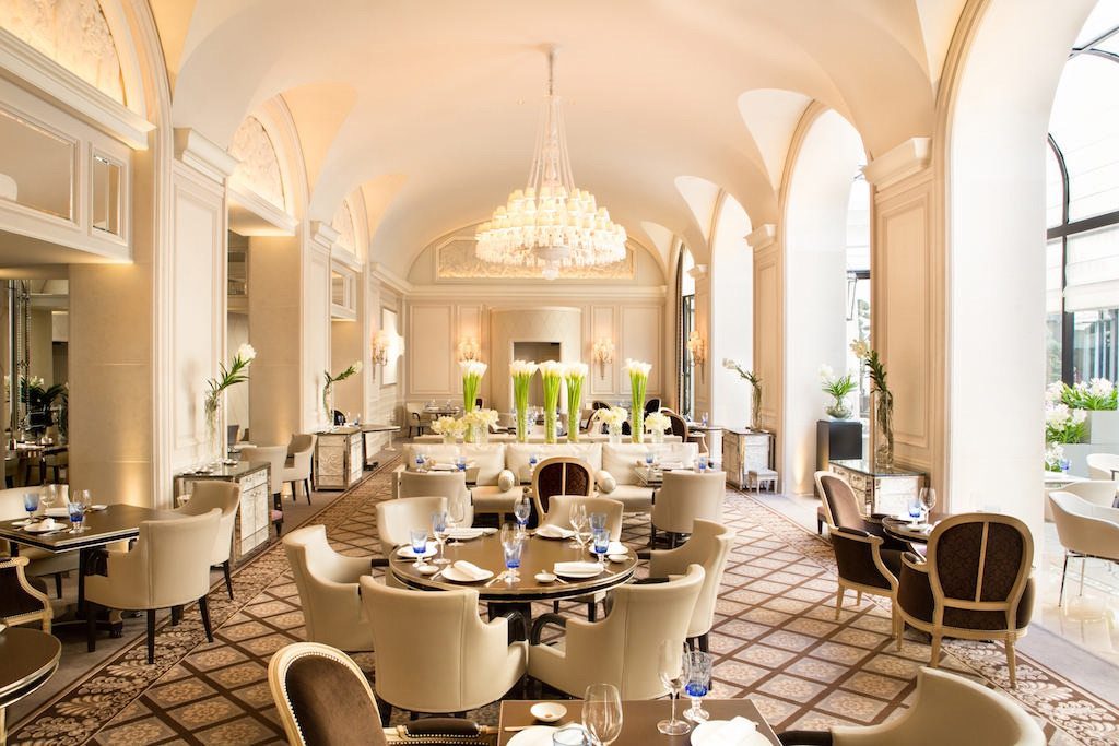 At Le George restaurant (shown here) at the Four Seasons George V hotel in Paris, servers are encouraged to wear their own clothes instead of wearing uniforms.