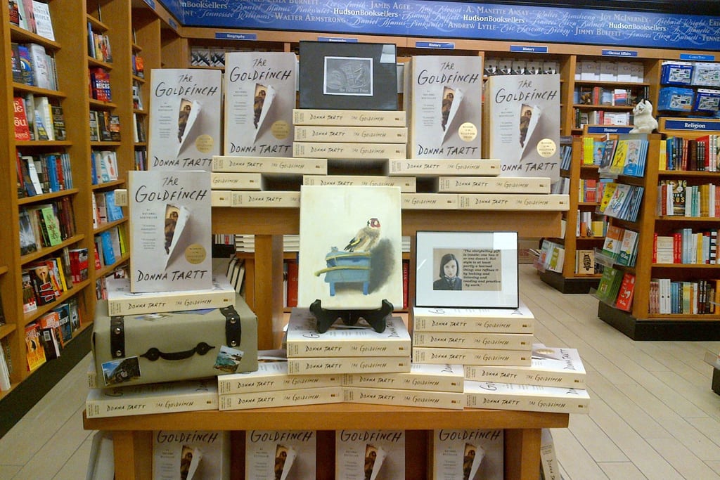 Copies of the bestselling book The Goldfinch at Newark Liberty International Airport's Hudson Booksellers store. The parent company of the retail chain plans to list on the stock market.