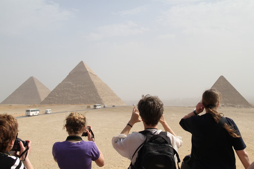 Tourists gaze at the pyramids in Giza, Egypt in late 2017. Travel agents report a surge on renewed interest in Egypt.