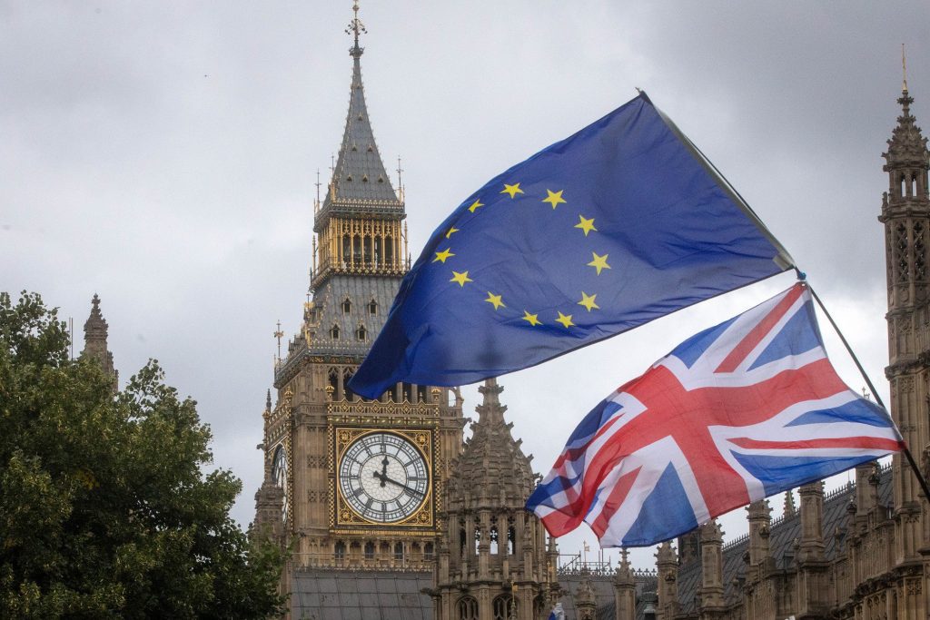 The Union Jack and Flag of Europe flying near the Palace of Westminster in London. Brexit is taking up a considerable amount of time for both the UK and EU.