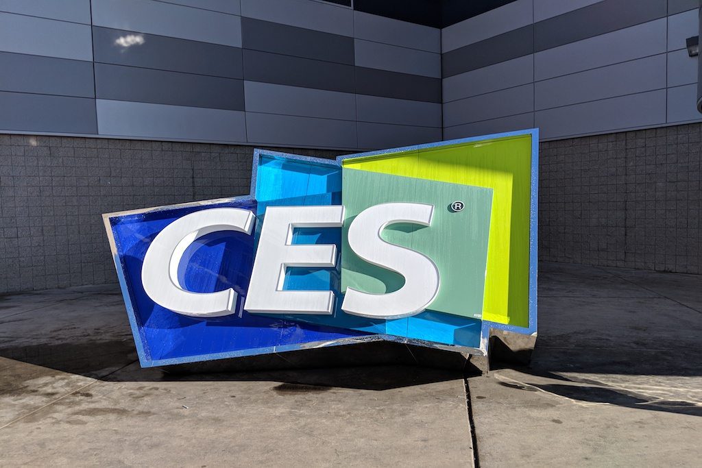A CES sign outside the Las Vegas Convention Center. As smartphones become connected to smart speakers and devices, travelers will want to access their travel information and even place bookings regardless of what device they use.