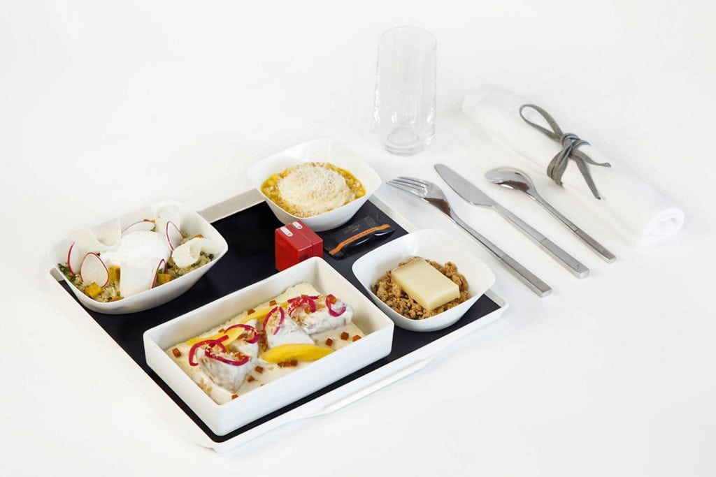Air France sells a meal created by Jean Imbert, a celebrity chef. Many airlines are adding premium-style amenities for coach travelers.