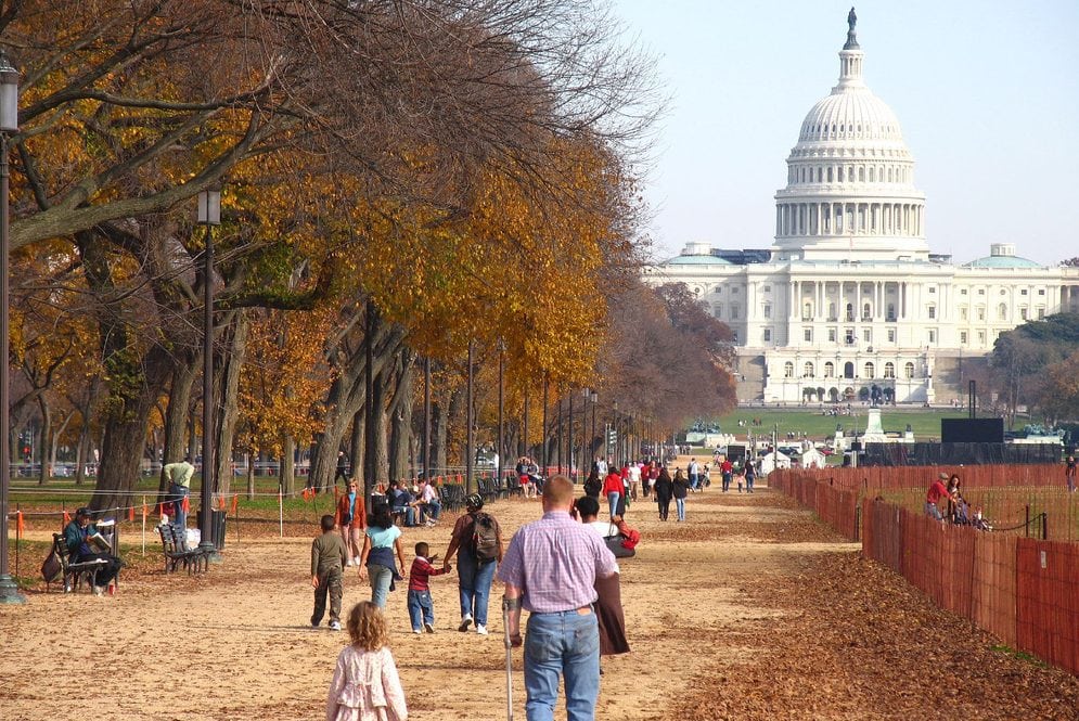 The travel industry hopes a new coalition will help it break through to President Trump. Pictured are tourists walking the National Mall in Washington, D.C. on November 10, 2006.
