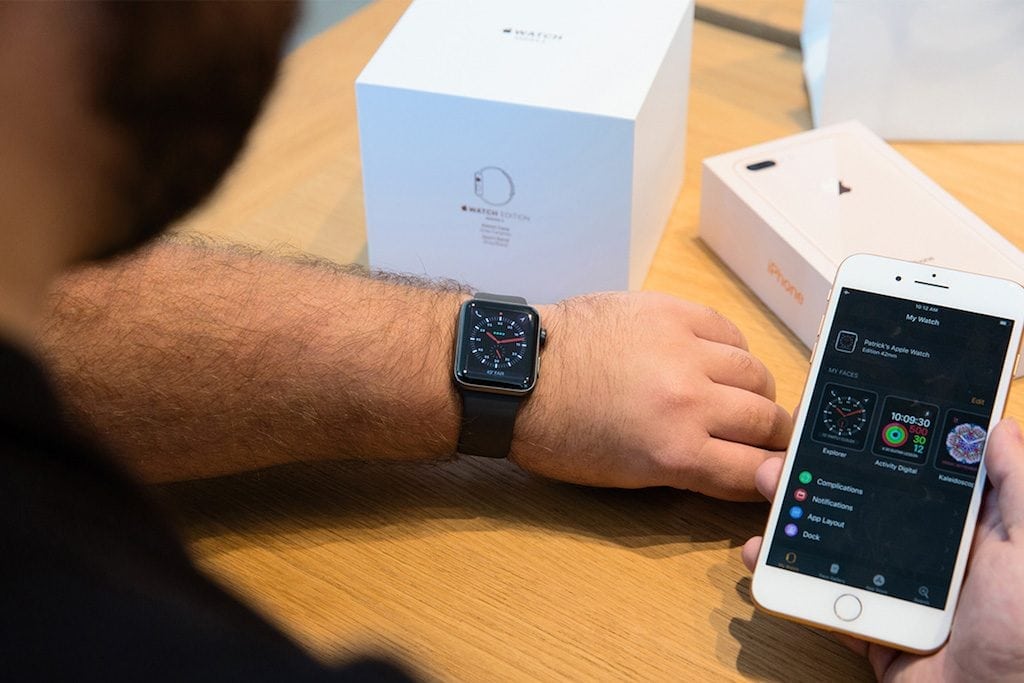 A man pairs his Apple Watch Series 3 at an Apple Store in New York City. Wearables and smart speakers are driving forward a revolution in voice search technology.