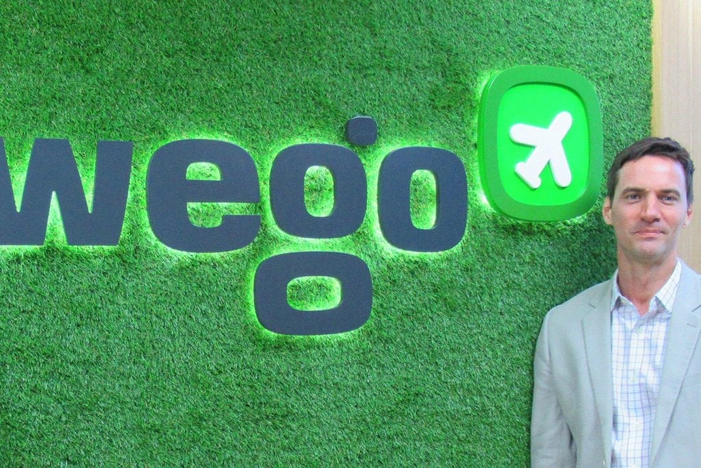 Co-founder and CEO Ross Veitch poses in front of a sign at the offices of Wego, a metasearch engine that debuted in Asia Pacific but is now focusing on the Middle East.