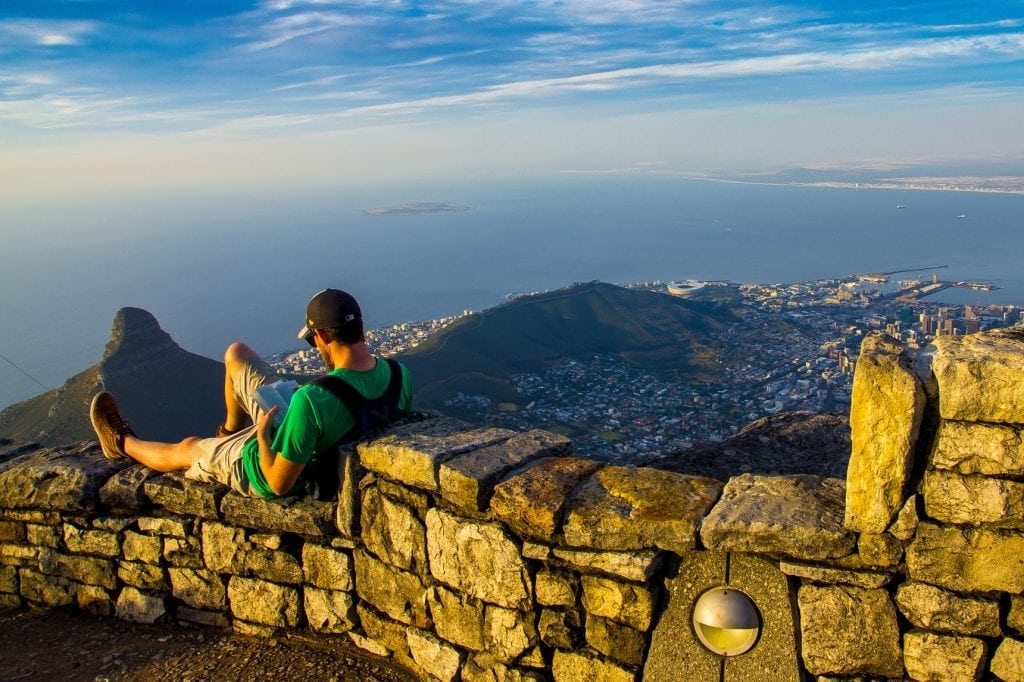 TripAdvisor redesigned its homepage for people looking for some travel inspiration. Pictured is a tourist on top of Table Mountain in Cape Town, South Africa. 