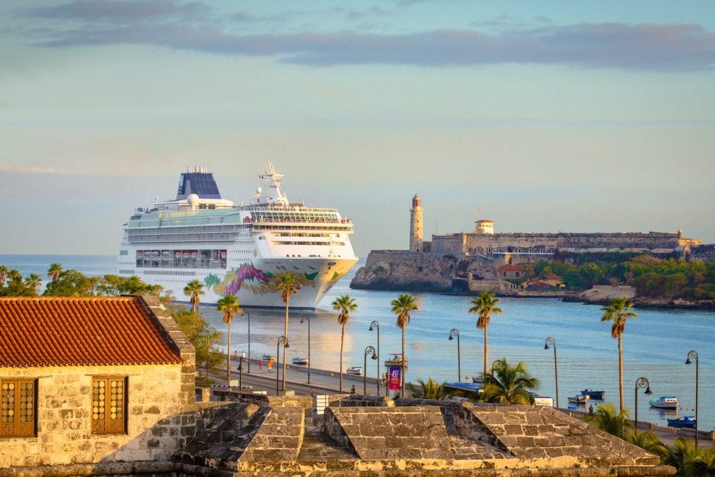 High prices on cruises to Cuba helped profit jump for Norwegian Cruise Line Holdings in 2017. In this promotional photo, Norwegian Sky arrives in Havana.