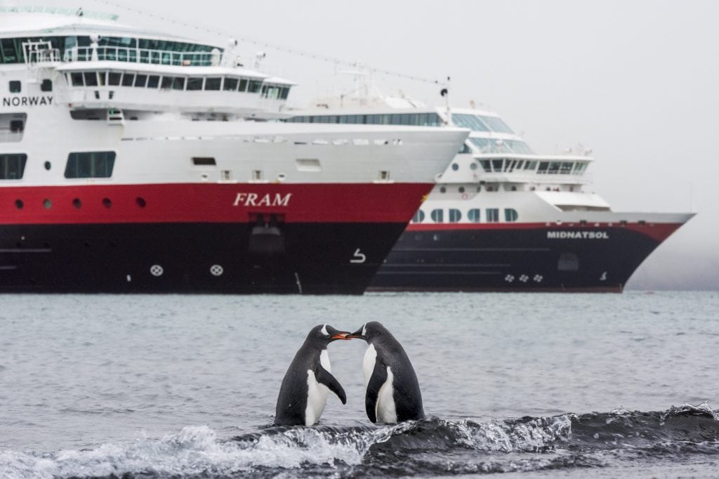 Two Hurtigruten ships are pictured in Antarctica. The expedition cruise sector is growing fast.