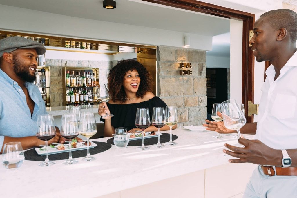 Wine tasting at Bar Roc at Ellerman House in Cape Town, South Africa. One of the hallmarks of what we've dubbed "new luxury" is the end of the stiff, old-fashioned way luxury hotels treated their guests.