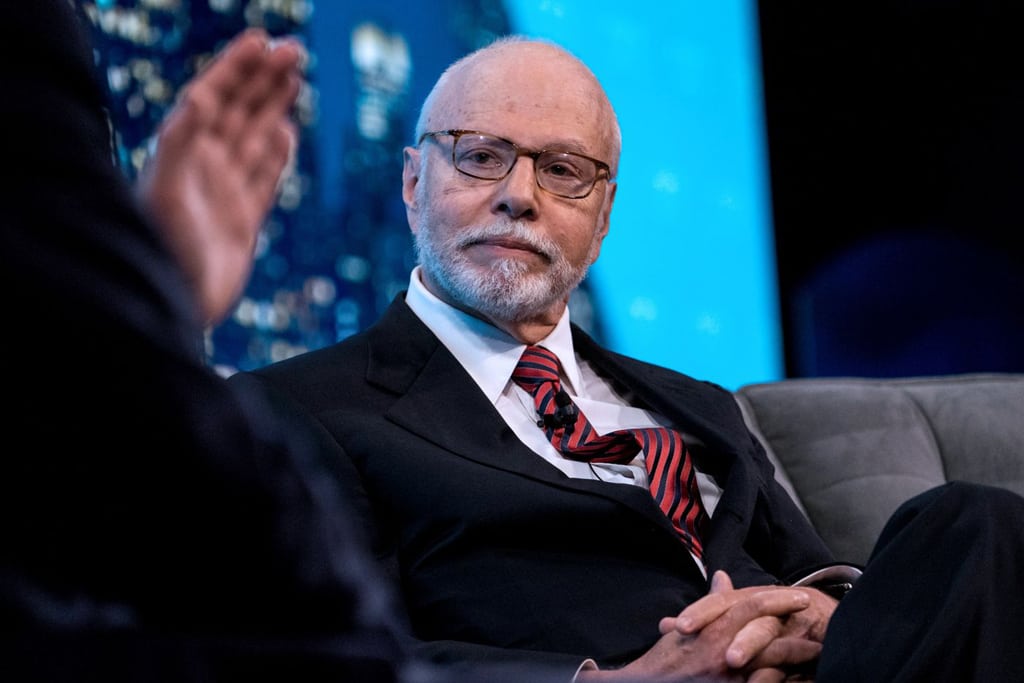 Elliott Management is a hedge fund run by Paul Singer, a well-known activist investor, shown here. Eliott has targeted Travelport, the travel distribution technology company, for a plan to take the company private in a buyout.