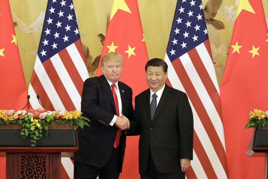 U.S. President Donald Trump is pictured with Chinese President Xi Jinping. The U.S. travel industry will suffer if Chinese tourism drops off amid tariff-related tensions.