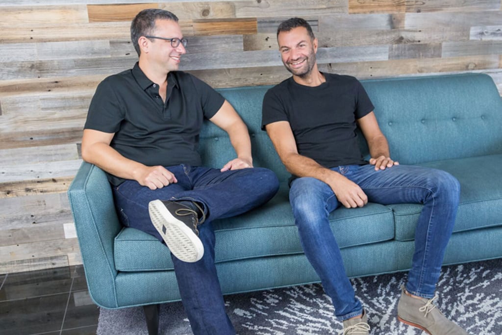 TripActions co-founder and CEO Ariel Cohen, left, with co-founder and chief technology officer Ilan Twig.