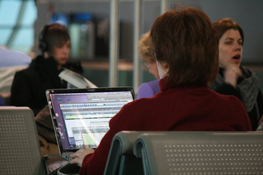 A traveler uses a laptop at the airport in Brussels. Data privacy has become a bigger concern in recent years as border searches of electronics increased in the U.S and authorities forced some travelers to stow laptops in cargo during flights.