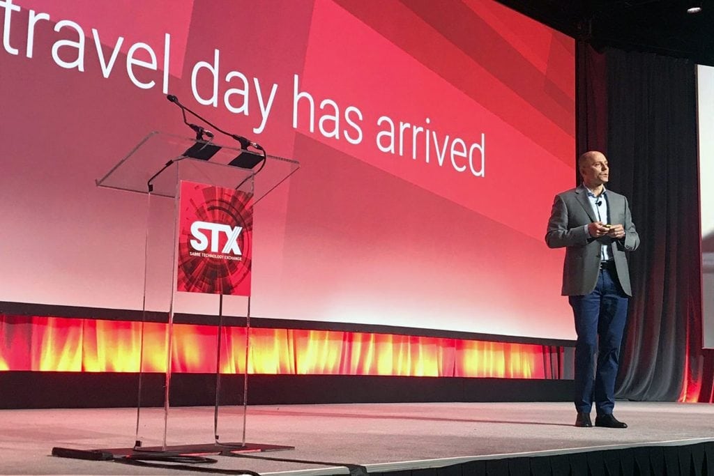 Sean Menke, a year-and-half into his job as CEO of Sabre, speaks at his company's annual customer conference in Dallas, Texas on April 10. The company wants to expand its sales of software to hotels.