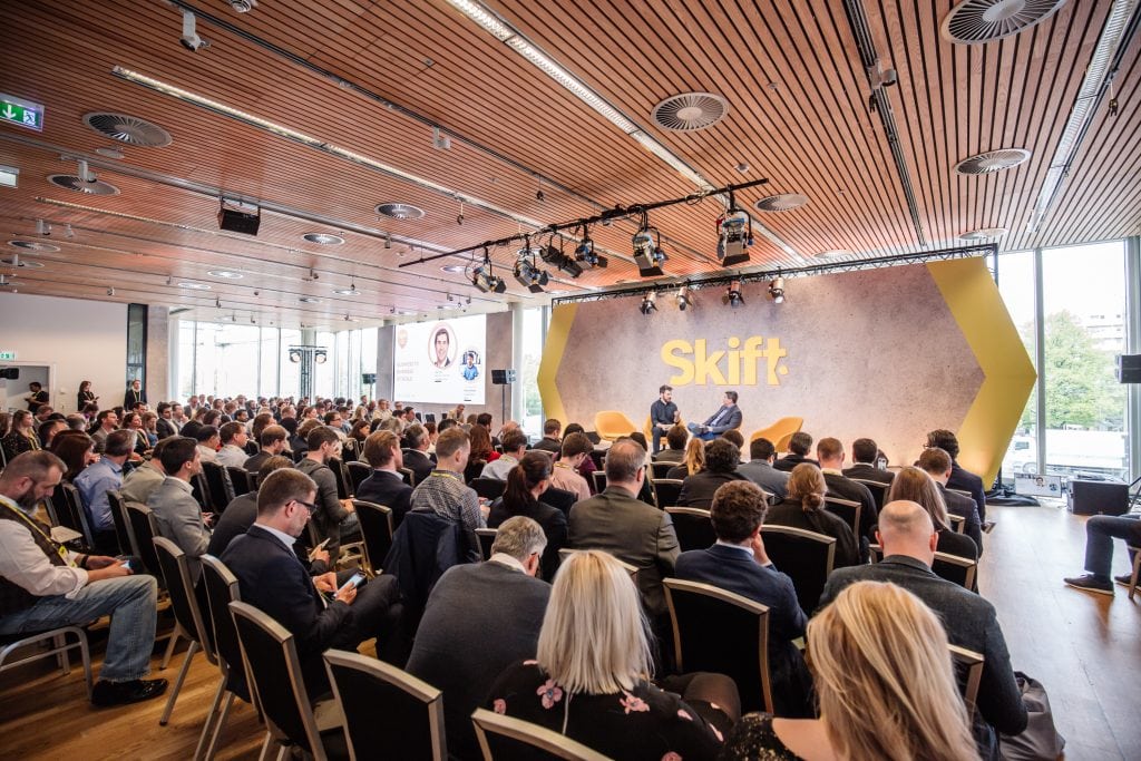 The conversations on stage at Skift Forum Europe elicited loads of insights. Pictured in the background is Skift's Europe Editor Patrick Whyte (left) and HotelBeds Group Executive Chairman Joan Vila.