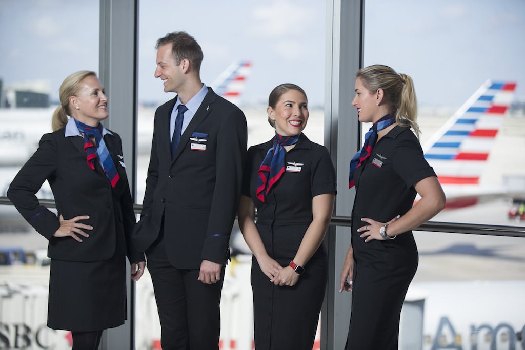 Roughly two-thirds of flight attendants say they have endured sexual harassment, according to a recent survey. Pictured are American Airlines flight attendants.